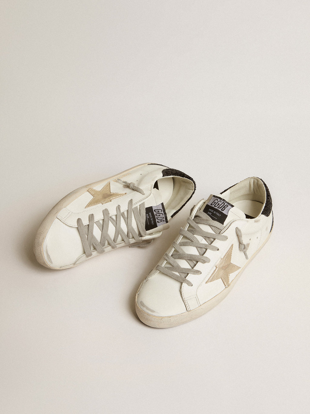 Super-Star with gold star and black glitter heel tab| Golden Goose