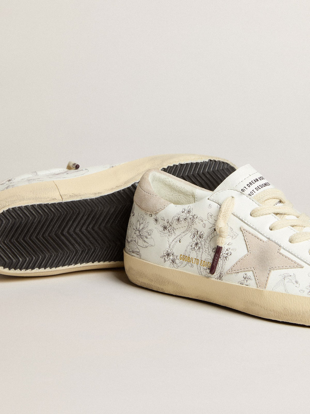 Men's Super-Star LTD CNY in white leather with lettering on the upper