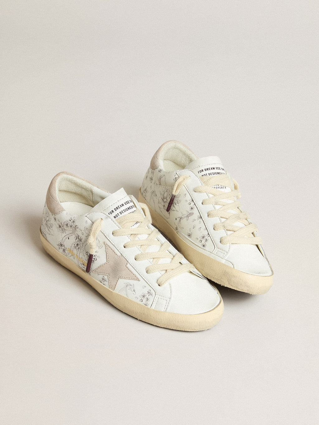 Men's Super-Star LTD CNY in white leather with lettering on the upper