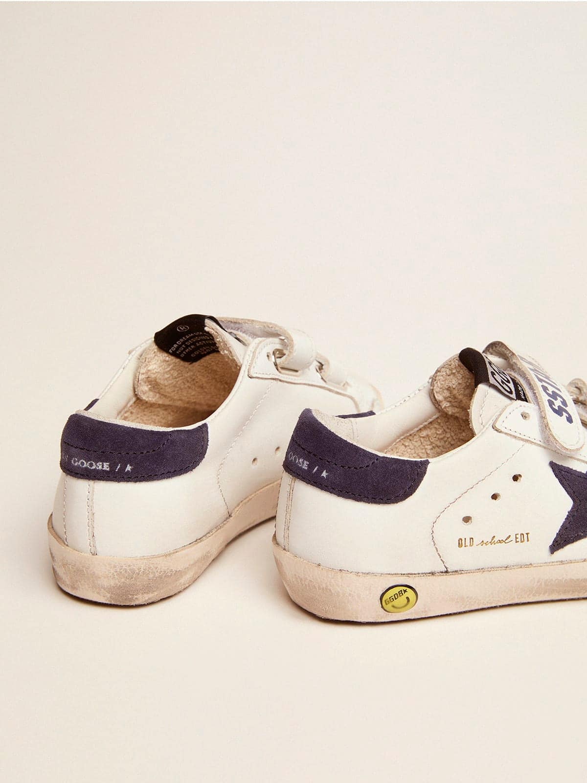 Old School Junior in white leather with blue suede star and heel tab| Golden Goose